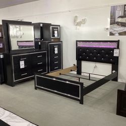 Kaydell Queen Upholstered Panel Bed with Mirrored Dresser, Chest and Nightstand Set