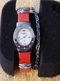 DESIGNER WATCH: Unique Charriol Azuro with Attached Matching Bracelet and Diamonds Surrounding its Face. Sells for $800 Used! Priced for Quick Sale.