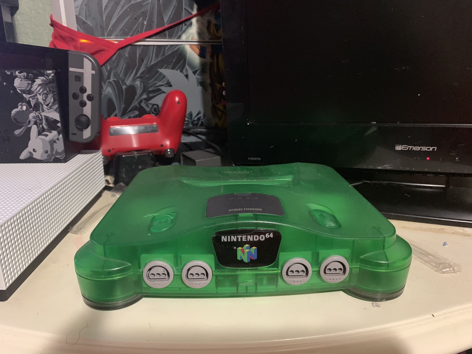 Jungle green Nintendo 64 With 11 games three controllers one rumble Pack