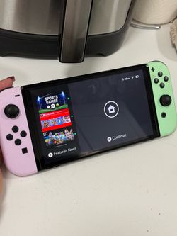 Nintendo Switch Bundle + Extra Controllers, 4 Games & Gaming Headset