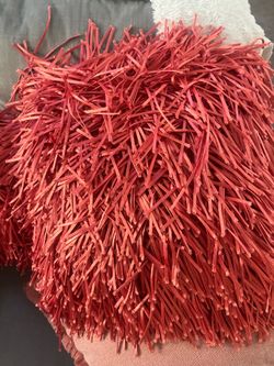 Decorative coral tassel pillows