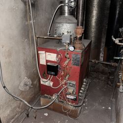 WORKING BOILER WITH OLD FASHIONED RADIATORS!!!!! (UPGRADED TO MINI SPLITS)!!  