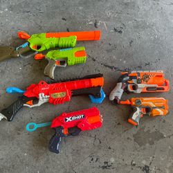 Six Nerf Guns And Extra Bullets