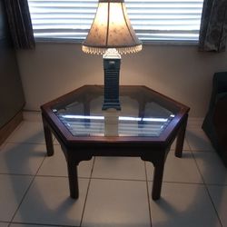 table and lamp has a small light inside as you can see in the photo 43x43 height 17