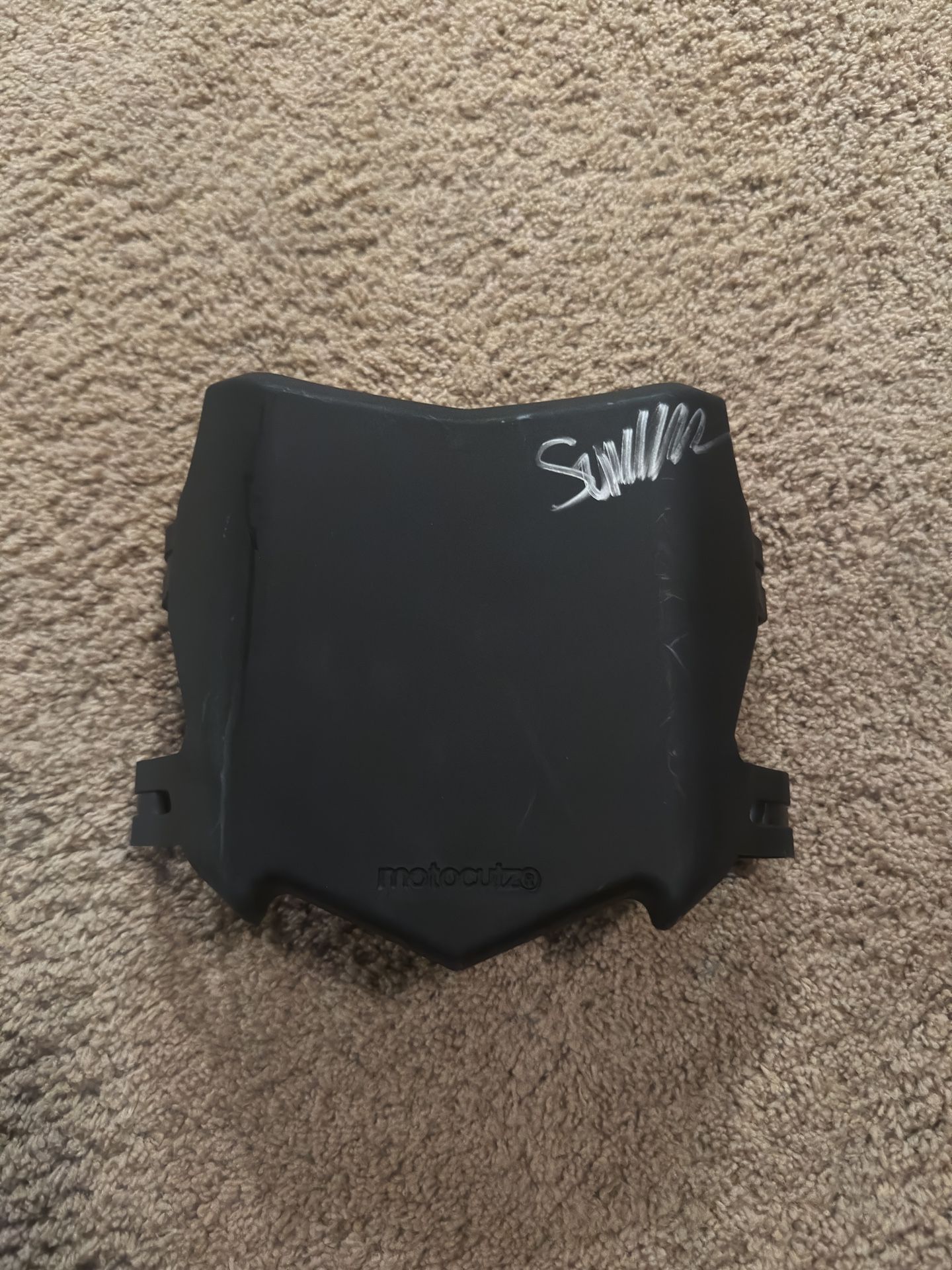 Motocutz’s plate signed by surronster