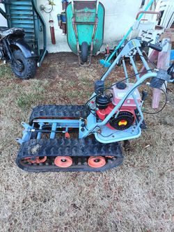Diesel powered tracked wheelbarrow
