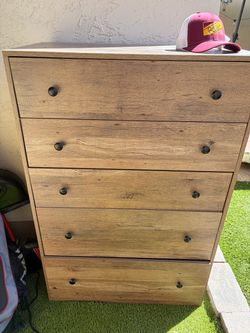 Tall chest of drawers