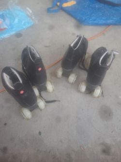 Two pair of light up wheel skates