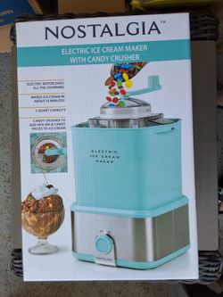 Electric ice cream maker with candy crusher