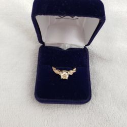 . 94 Very Good/Very Good, Yellow Diamond.  14K Gold Band With White Diamonds.  Comes With Papers! . 