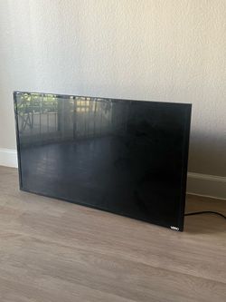 Flat screen TV with remote and party speaker