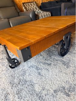 Excellent condition Vintage Industrial Style* *Solid wood and metal wheels *Dimensions* (L47” W31” H16”)