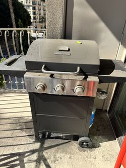 Grill And Full Propane Cylinder