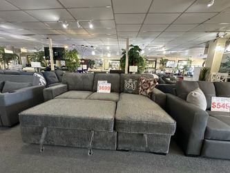 Brand New Gray Fabric Sectional Sofa with Pull-Out Bed