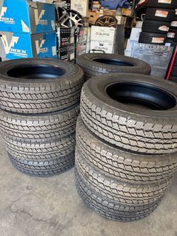 255/70R18 Bridgestone Dueler A/T RH-S — 4 Like-New Takeoff Tires