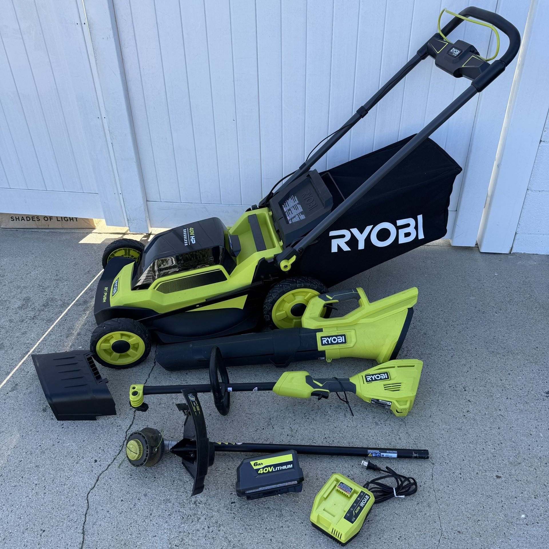 RYOBI 40V HP Brushless 20 in. Cordless Battery Walk Behind Push Lawn Mower, String Trimmer, Blower, 6ah Battery and Charger Combo Kit
