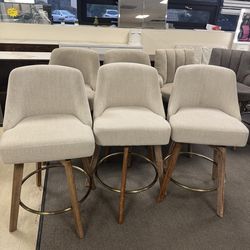 Brand new Mid-Century Modern counter height bar stools (set of 3) – $330 26” seat height, 360° swivel, solid wood legs, wrap-around backrest, sand lin
