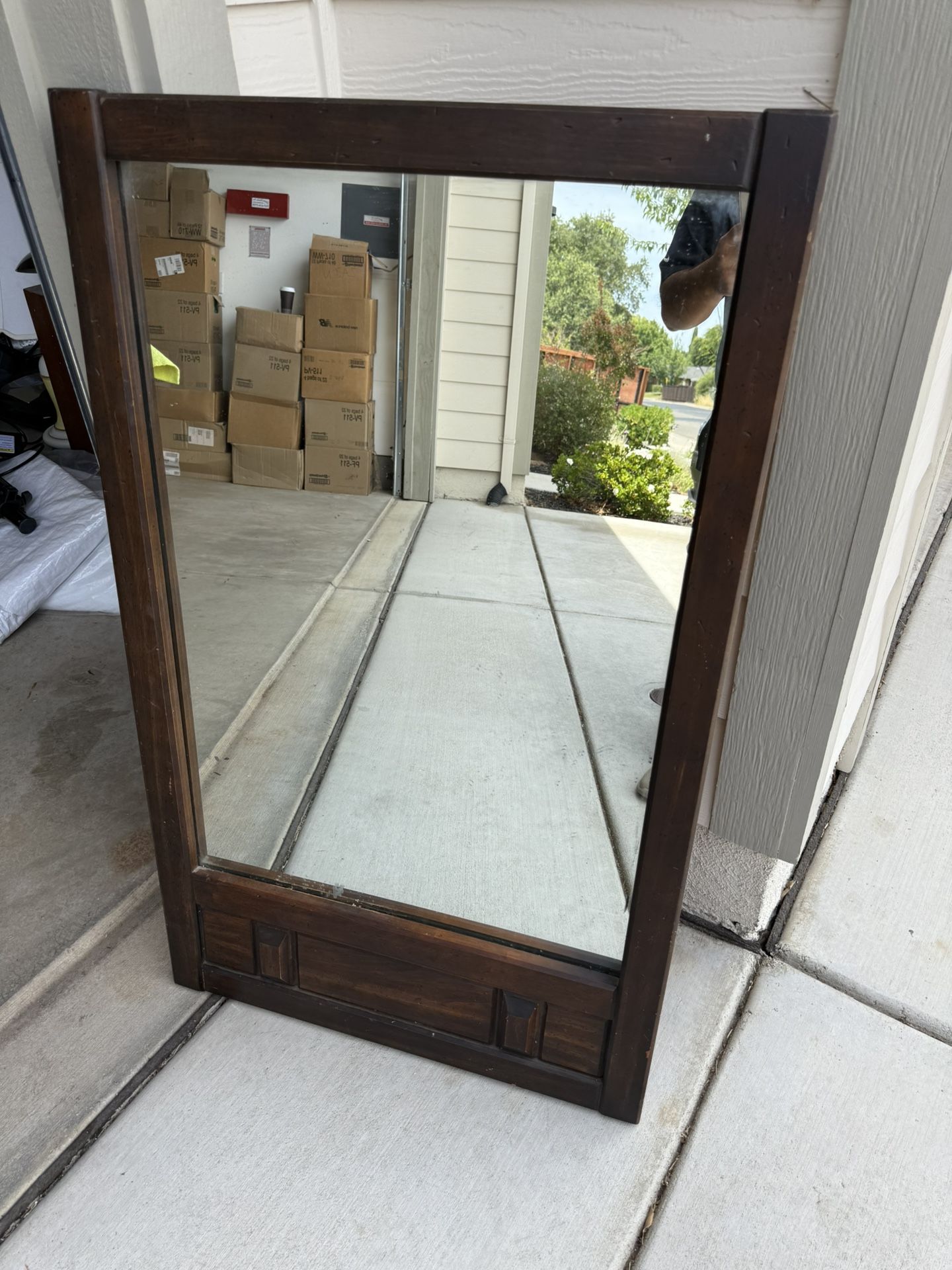 Old solid wood heavy hanging mirror in great condition!