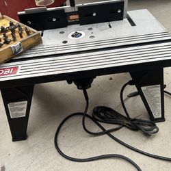 Ryobi Router Table with a mounted Router