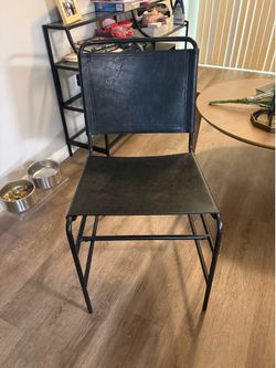 4 black leather metal chairs - $50 obo