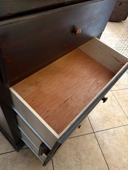 5 drawer dresser dark wood color. big size.