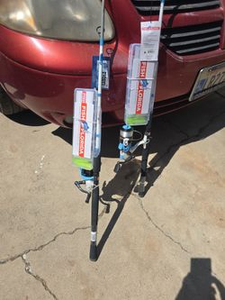 2 new fish Florida, fishing Poles. With tackle boxes ?. Guessing seven foot long