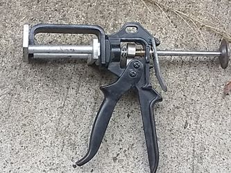 Caliper compressor for dual piston