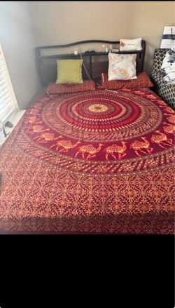 Queen size bed frame with soft comfy mattress
