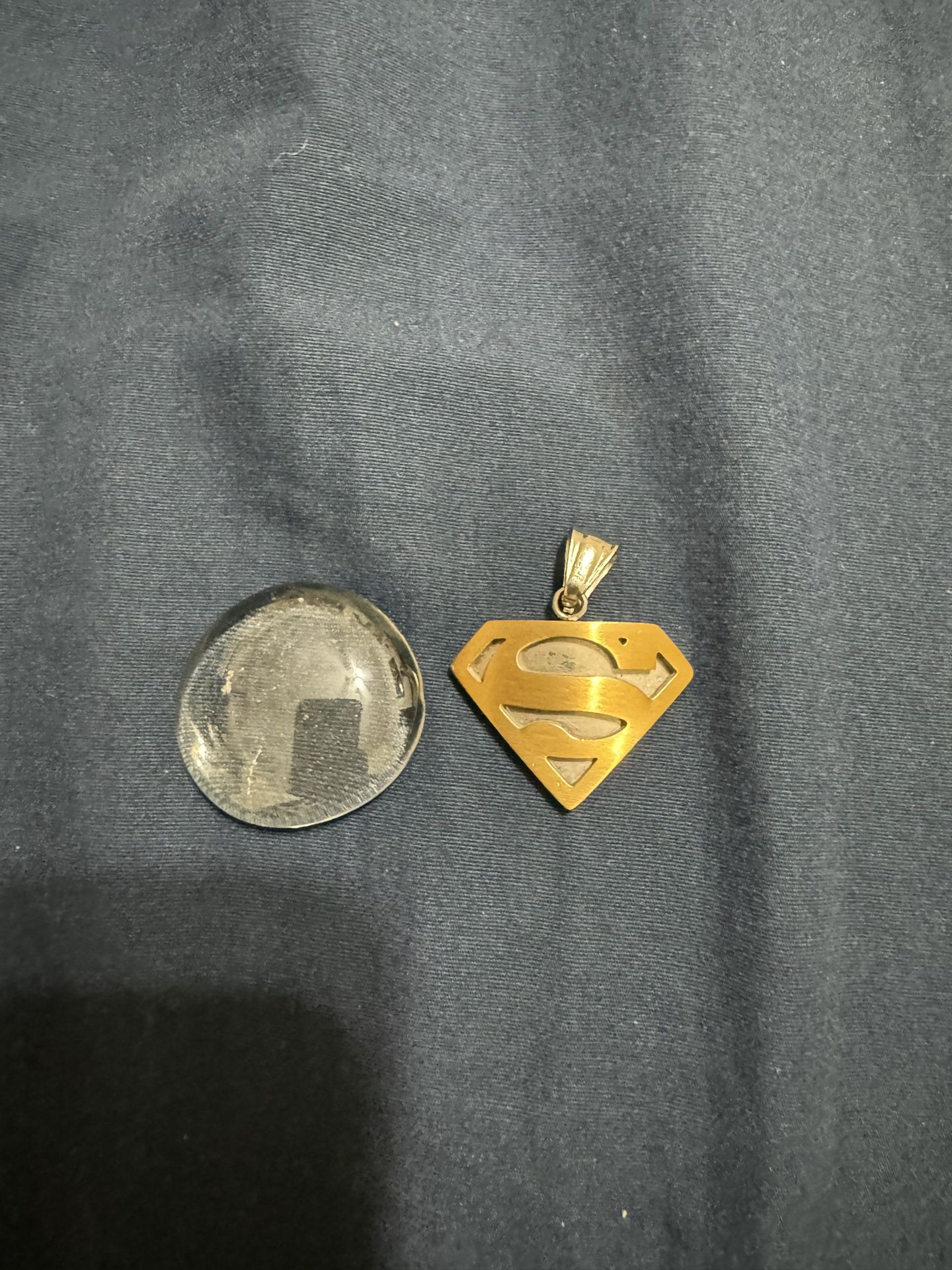 Real Stainless Steel Superman Pendant With A Gold Accent
