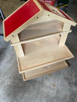 multi-level wooden dollhouse toy