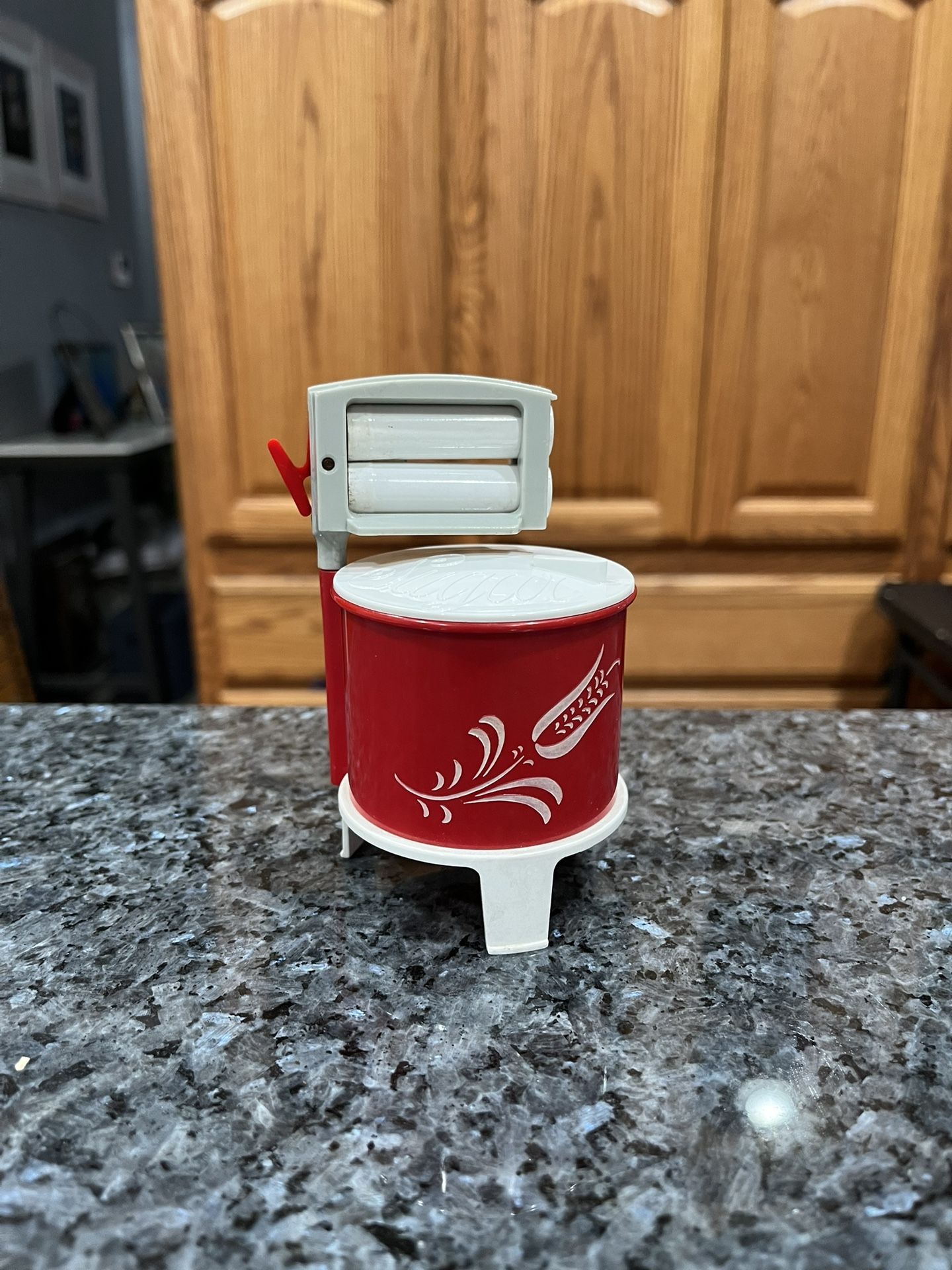 Vintage Plastic Sugar with a pair of salt and pepper shakers wringer washing machine.  Preowned never used.  
