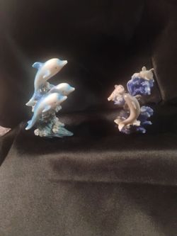 Dolphin figurines