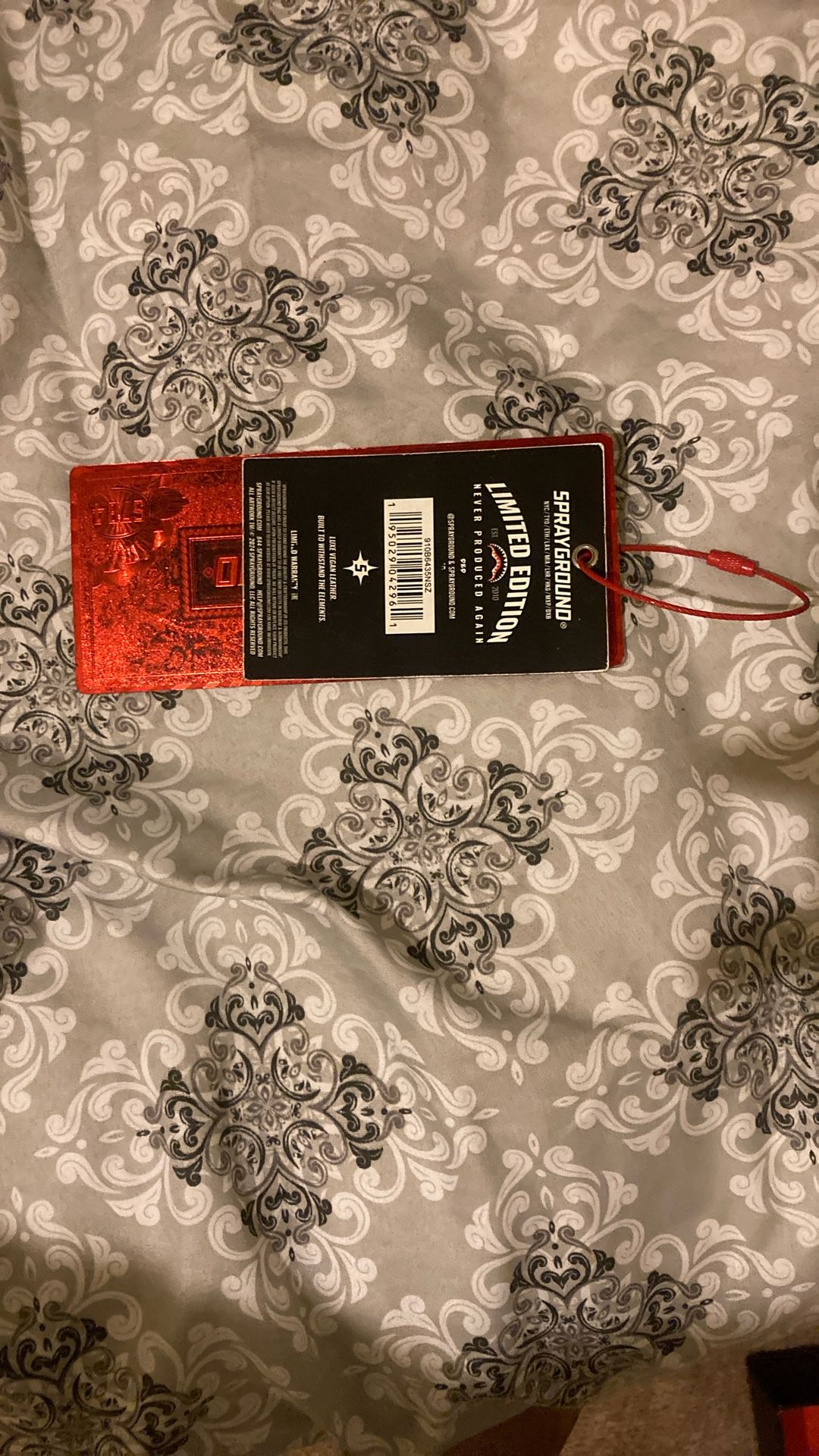 Red Spray Ground Tag