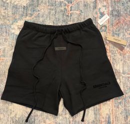 Black fear of god essentials shorts
