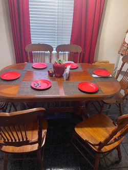 Wooden table with 6 chairs