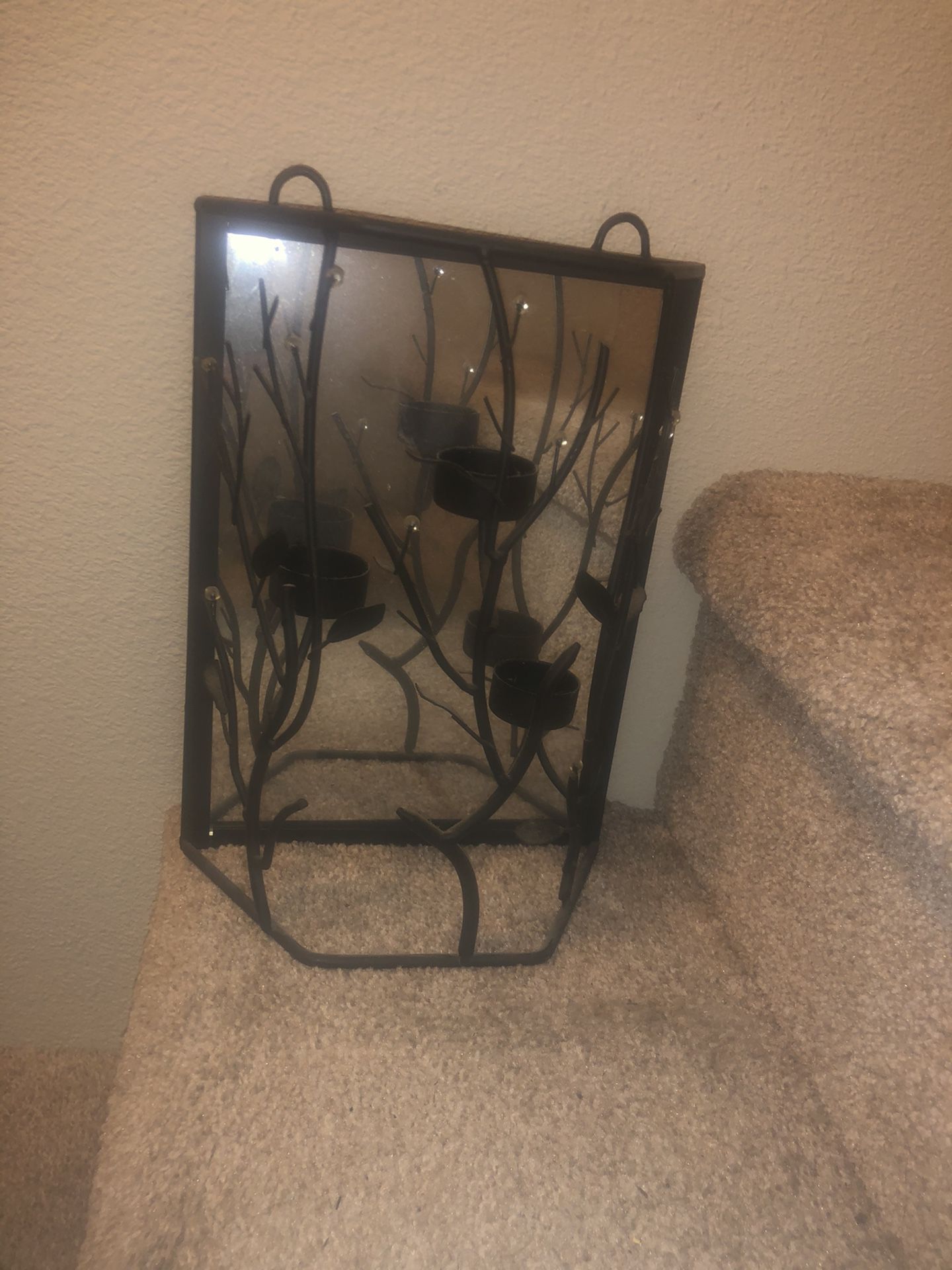 Black metal mirrored tea light wall hanging