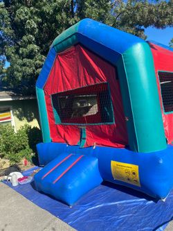 Multicolor Bounce House with blower for sale