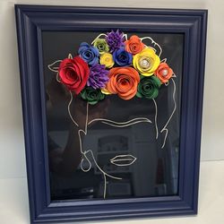 Frida con flores $25