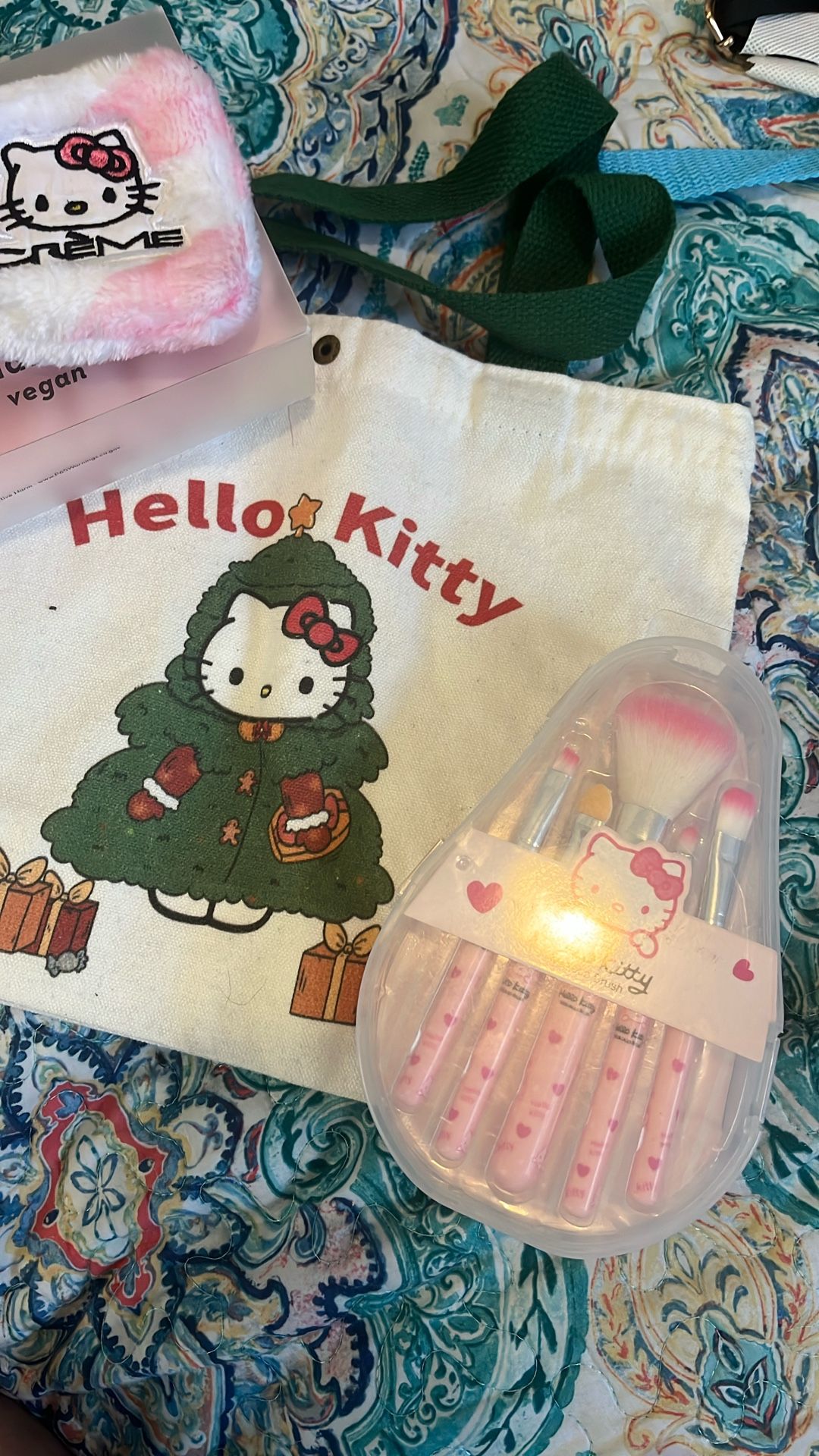 Hello Kitty, plushy spa headband, and make up brushes with a tote bag