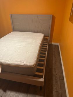 Queen size bed frame (no mattress)
