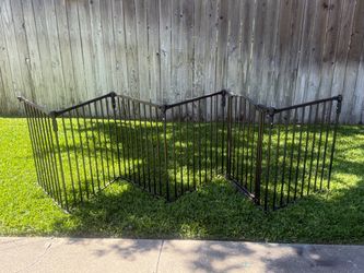 a multi-panel metal configurable pet/baby gate