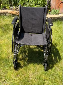 Wheelchair with Legs and Butt Pad