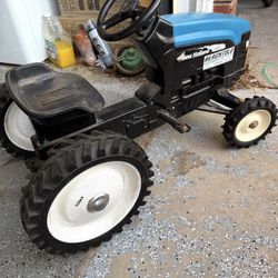 ERTL NEW HOLLAND  LP Tractor In Good Shape 