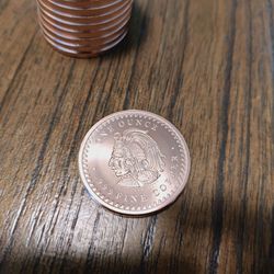 1 ounce copper Aztec design