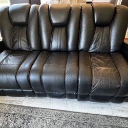 Used Black Reclining Sofa with Cup Holders