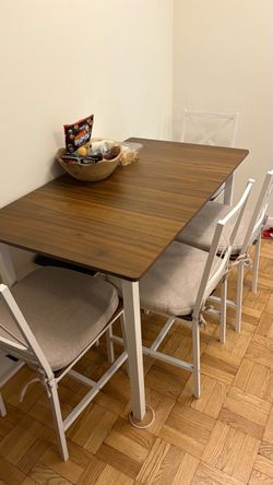Wooden dining table with 4 chairs