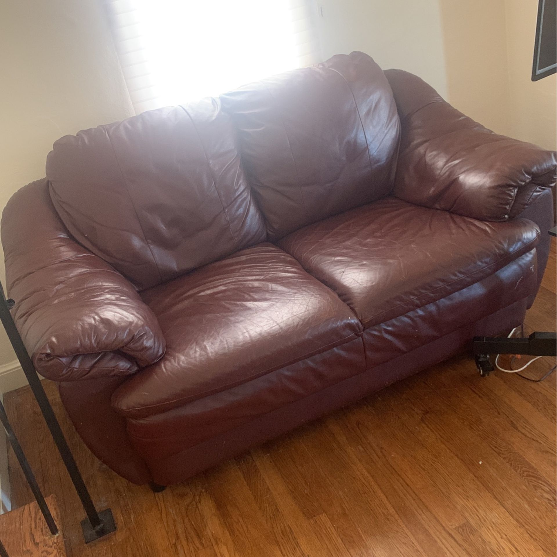 Brown leather Loveseat Couch