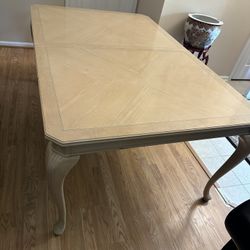 FurnitureLand south wooden dining table with protective pads with 2 leaves excellent condition