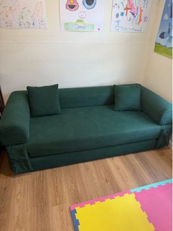 Boneless green corduroy couch