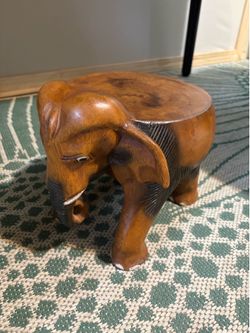 Solid wood elephant plant stand